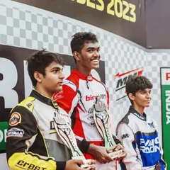 Driver Abhay celebrating a hard-earned podium finish at the Meco FMSCI RMC India 2023. His results include P1 in the finals for both Round 2 and Round 3.
