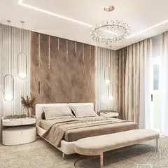 We designed this master bedroom as a serene and luxurious retreat. The space features a sophisticated palette of neutral tones, layered textures, and custom lighting, including a statement crystal chandelier and elegant pendant lights, to create a warm and inviting atmosphere.