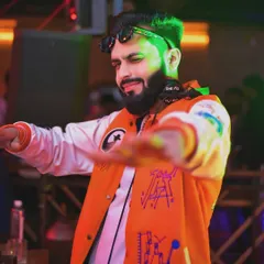 From the console to the crowd, I bring the chaos in style. This is me in my element, ready to get the party started with some desi beats.