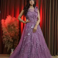 This onion pink gown is a dream for creating elegant reception or cocktail party looks. The delicate silver embroidery and modern silhouette photograph beautifully, giving your portfolio a high fashion, contemporary edge. It’s all about showing your versatility as an artist.