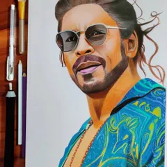 My colored pencil artwork of Shah Rukh Khan from the movie Pathaan. I used vibrant colors on A4 paper to capture his cool and stylish look.