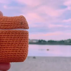 This simple, solid-colored crochet Airpod case is perfect for a minimalist look. It's washable, durable, and fits snugly over your device.