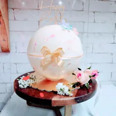 A cake full of surprises. Our Pinata Cake is a chocolate sphere that you break open with a small hammer to reveal a delicious cake and other treats inside.