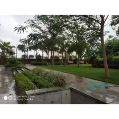 We incorporated raised planters and a variety of shrubs alongside the lawn in this podium garden. This adds depth and interest to the urban landscape design.