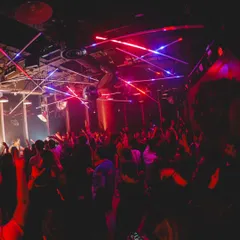 A wide shot of the packed dancefloor at Tuff Club, Singapore. The international love for Afro-Desi music is incredible to witness.