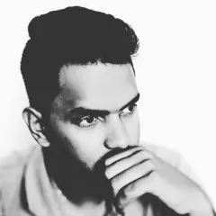 A pensive black and white shot. A crucial part of being an effective lawyer is the ability to think critically and consider every angle before advising a client or appearing in court.