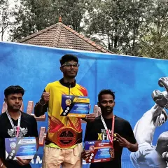 Standing tall on the podium with the championship belt. Our fighter Chandan after his victory at the Golden Mongkhon Muay Thai Nationals. We build champions through discipline and dedication.