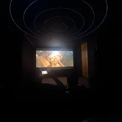 A look at a completed 7.2.4 Dolby Atmos home theater, delivered in just 15 days. The custom fiber optic ceiling creates a magical starlit sky, adding another layer of immersion to your movie-watching experience.