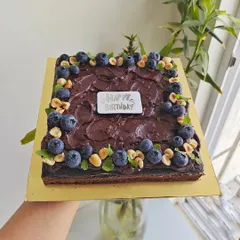 A full view of the indulgent and healthy chocolate cake I made for a client with dietary restrictions. It's gluten-free, sugar-free, and dairy-free, proving you don't have to compromise on taste.