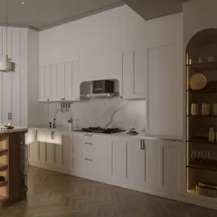This view highlights the kitchen's ample storage and counter space. An arched, backlit display cabinet provides a beautiful spot for showcasing glassware, while under-cabinet lighting ensures a well-lit workspace.