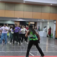 Leading an interactive Zumba class for a corporate client. I design these on-site sessions to be accessible and fun for everyone, ensuring the whole team feels included and energized.