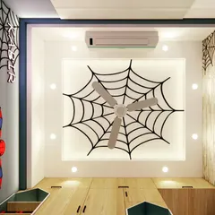 Look up! The fun continues on the ceiling with this custom Spiderman web design integrated with the fan and lighting.