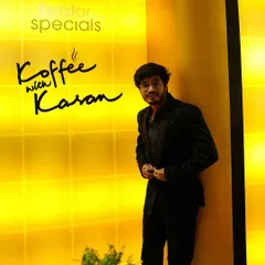 Another shot of RJ Raghav in his custom Dawood Khan jacket. The fit and fabric were chosen to create a sharp silhouette against the bright, iconic background of the show's set.