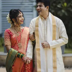 Laughter and love captured in a single frame. Roshan and Meenakshi share a happy moment during their wedding day portraits. We aim to make couples feel comfortable, so their genuine personalities shine through.
