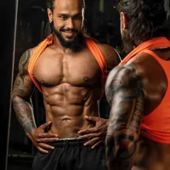 The result of discipline. A defined physique isn't built overnight; it's carved through consistent effort and a smart nutrition plan. I help my clients achieve their aesthetic goals, like developing a six-pack, by creating a sustainable and effective regimen.