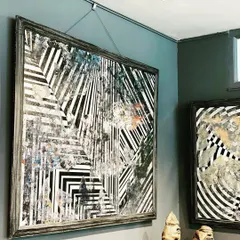 This large, framed piece showcases my love for geometry. The composition uses intersecting black and white lines to create a sense of depth and complexity, perfect for a gallery wall or as a standalone statement.