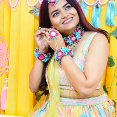 A stunning portrait of the bride-to-be, glowing with happiness at her Mehendi ceremony.