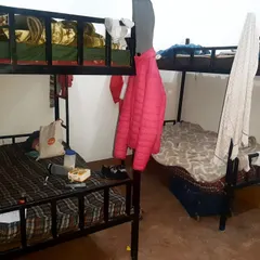 A closer look at the bunk bed setup in our athlete hostel. The focus here is on training and community, not luxury.