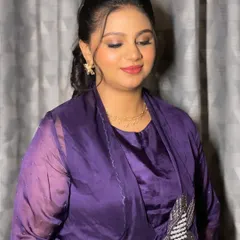 A close-up of the makeup, showing the soft, blended eyeshadow and flawless skin finish. This look is perfect for evening events and photographs beautifully.