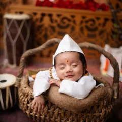 A tiny Varkari pilgrim finds a moment of blissful sleep. The details, from the Gandhi cap to the peaceful smile, make this shot special.