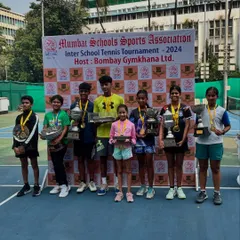 The winners of the Inter School Tennis Tournament 2024, hosted at Bombay Gymkhana, proudly displaying their trophies and medals.