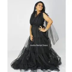 The mother's gown is a beautiful tiered black tulle dress that is both elegant and comfortable for posing with your little one.
