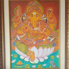 A framed Kerala mural of Lord Ganesha, painted by one of my students. This style is known for its bold lines, natural pigments, and depiction of mythological stories.