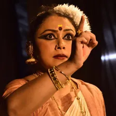 The essence of Mohiniyattam lies in its 'abhinaya' or expression. This is a close-up from a solo recital at Sreeramaswami temple, where every glance and gesture tells a story, allowing the dance to shine through the dancer.