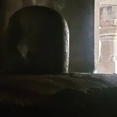 The sanctum at the Elephanta Caves. The play of light and shadow in these ancient, excavated spaces creates a profound sense of peace and mystery, sparking deep contemplation.