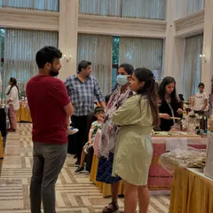 Shoppers and vendors deep in conversation. These are the moments that lead to sales and help you build a customer base.