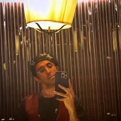 A great example of a curated client look. This selfie shows off a cool, edgy vibe with a burgundy vest and a butterfly-adorned beret. It’s all about mixing and matching pieces to create a unique style.