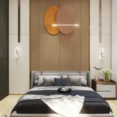 This bedroom design uses a sophisticated mix of neutral tones, modern art, and sleek furniture to create a space that feels both luxurious and calming.