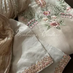 A detail shot of the silk chanderi suit, showing the embroidered lower and the crushed silk dupatta.