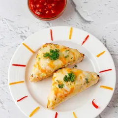 A simple and clean shot of cheese toast with a side of salsa, perfect for a Zomato or Swiggy menu listing.