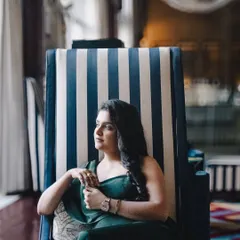 The flowy fabric and comfortable fit of this jumpsuit ensure the client feels as good as she looks. My goal is always to combine style with practicality for professional women.