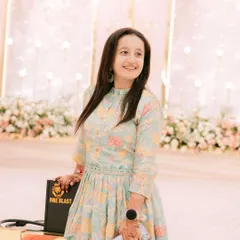 A happy moment at a friend's engagement, who was also my client! I'm dressed in a lovely pastel dhoti-kurta set, perfect for a day function.