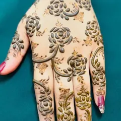 For all the rose lovers out there! This design features beautifully shaded 3D roses scattered across the back of the hand, creating a modern and romantic henna look.