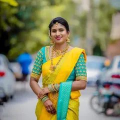 A vibrant and happy look for a special day. This client chose a bright yellow silk saree, and I designed a contrasting turquoise blouse with matching yellow and gold beadwork on the sleeves.