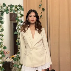 Who says workwear has to be boring? I paired this sharp, double-breasted blazer with a delicate lace skirt for a look that’s professional yet full of personality.