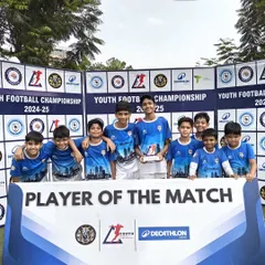 Our U-13 squad with their Player of the Match award, a testament to their collective effort and our coaching project.