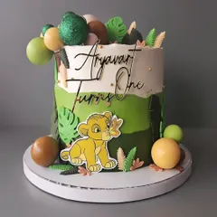 A majestic Lion King theme cake for Aryavart's first birthday. This cake features Simba and the vibrant colors of the African savannah, made with a delicious seasonal mango flavor.