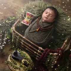 A detailed view of our little Mahadev theme. The baby is safely wrapped and posed in a basket, surrounded by symbolic elements that honor the deity.