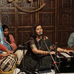The complete ensemble during a baithak, with vocal, tabla, harmonium, and tanpura. We ensure a full, authentic soundscape for every performance, whether it's in a large hall or an intimate room.