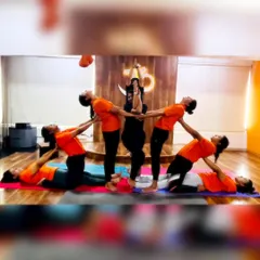 Cool yoga formations ahead! Our students working together to create a beautiful and complex group pose, showcasing trust, balance, and teamwork.
