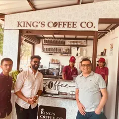 Our team with the founders of King's Coffee Co. at their original kiosk. This image shows the beginning of a success story that we are now helping to scale into a national franchise.