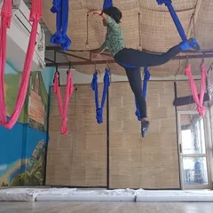 This is the feeling of flying. An arabesque pose in the aerial hammock, which builds leg and core strength while creating beautiful lines. My training focuses on proper form to ensure every movement is both safe and graceful.
