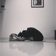 Paschimottanasana, or the seated forward fold, is a deep stretch for the entire back of the body. Years ago, I couldn't touch my toes; this pose taught me patience and the art of surrender.