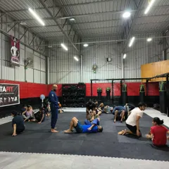 A wide view of our training floor. Kids, teens, and adults train side-by-side, creating an environment of mutual learning and encouragement where everyone is both a student and a teacher.