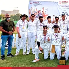 The K J Somaiya Institute of Management Cricket team celebrates with their trophy after clinching their first-ever Lakshya 2026 title. This hard-fought victory is a proud moment for the entire institute.