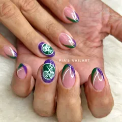 Custom Wimbledon-themed nails for a client traveling to London for the tournament. We included the official colors and even hand-painted the logo.
